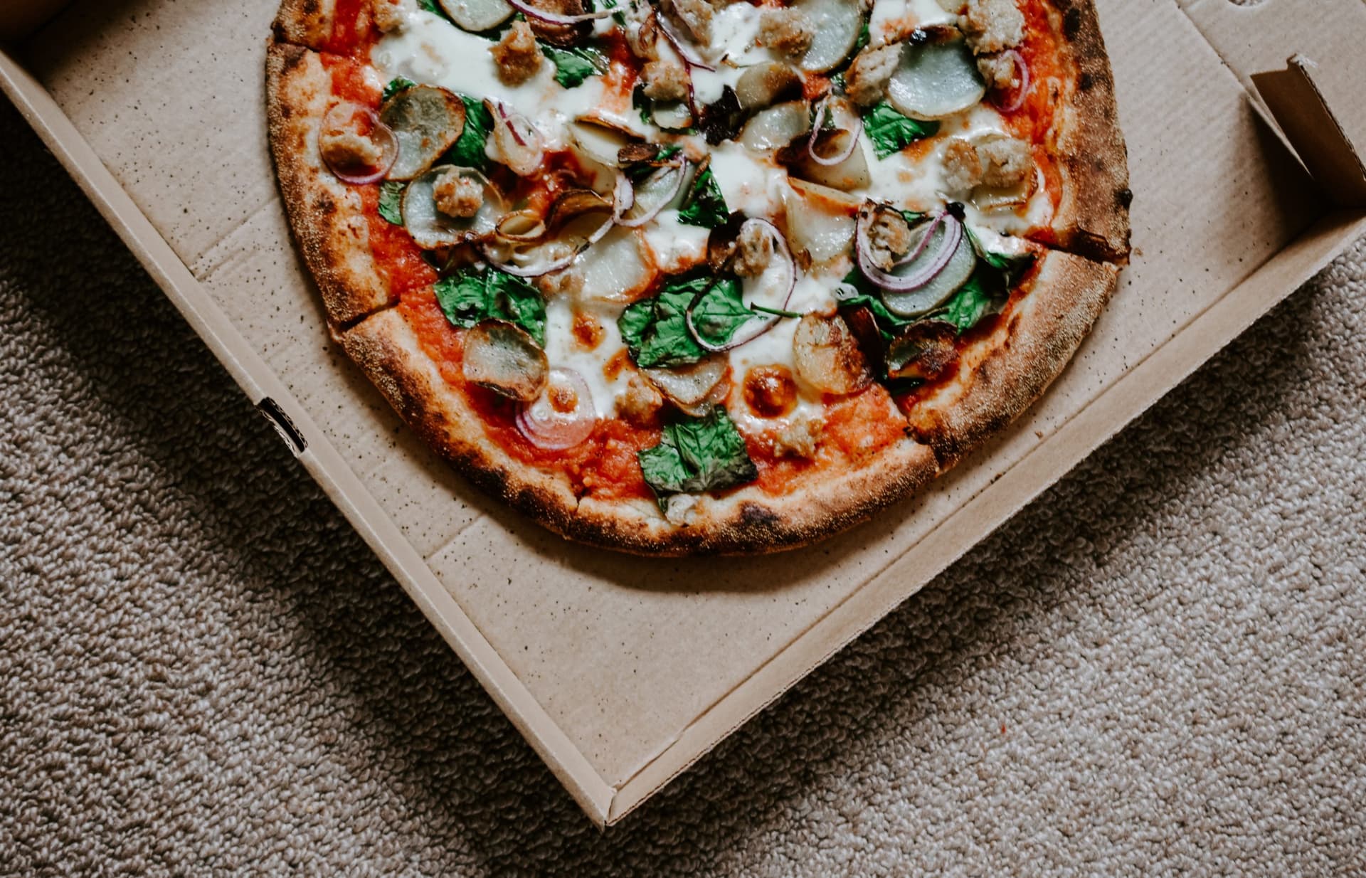 Why Is a Pizza Box Square When Pizza Is Round? The Reason We Use Square Boxes