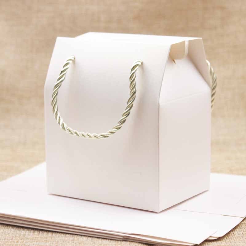 Handle box with gold cord handles and a white kraft finish