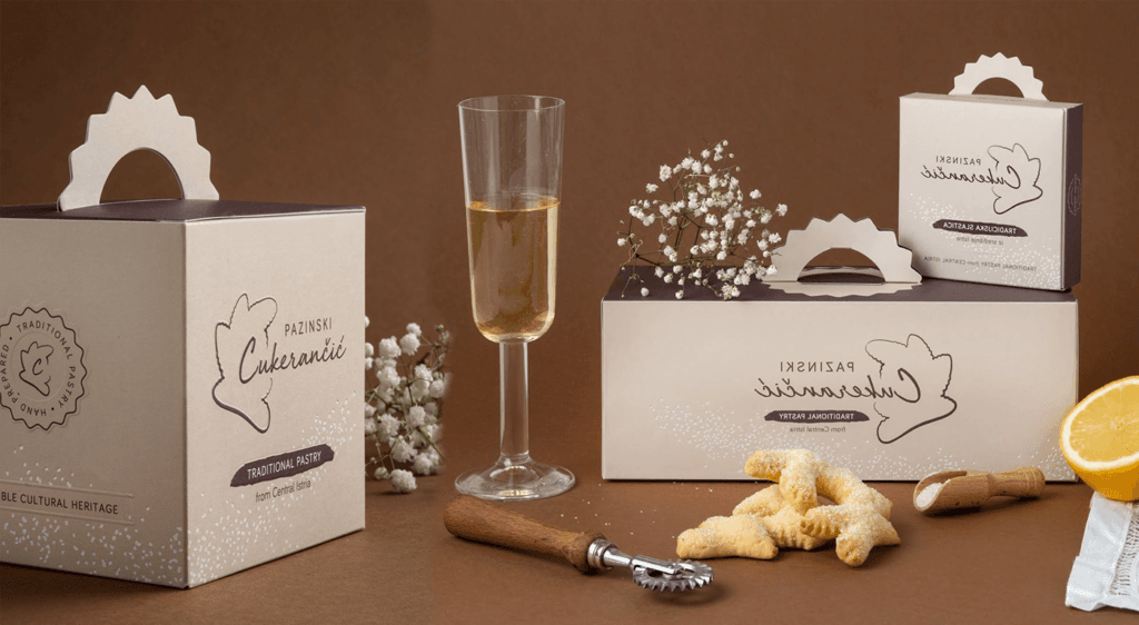 Handle box with a clean design, handwritten logo, and bread-shaped form that pairs well with traditional sweets