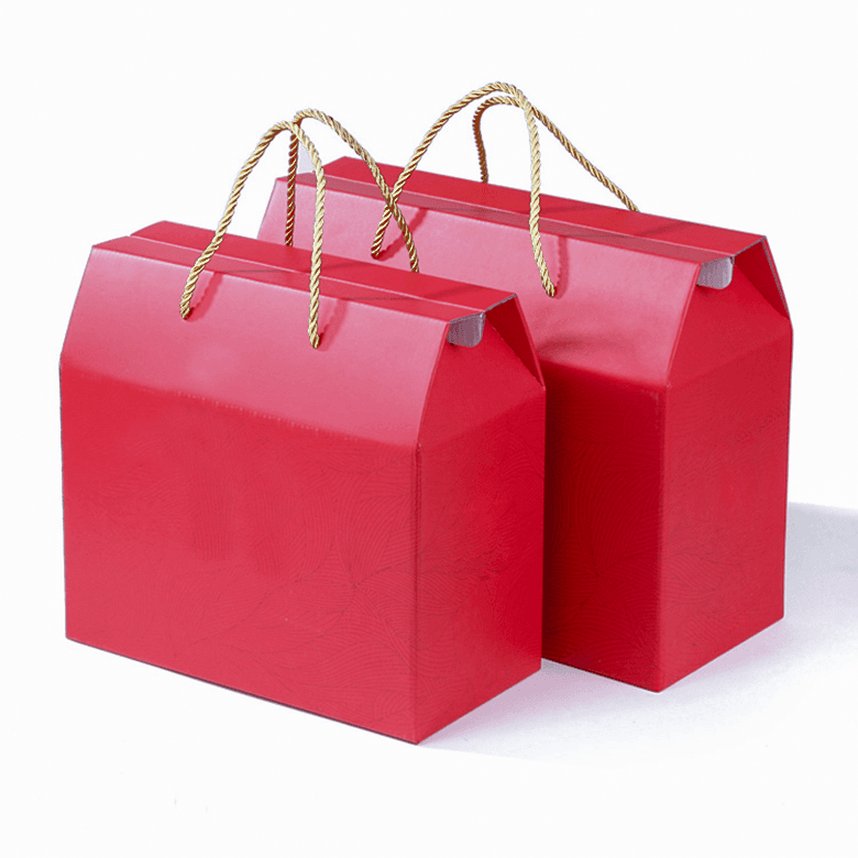 Corrugated handle box with gold cord handles and a red background